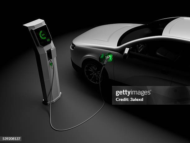 charging electric cars - hybrid vehicle stock pictures, royalty-free photos & images