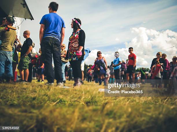 summer crowd of people, fast food, public park, uk - filmfestival stock pictures, royalty-free photos & images