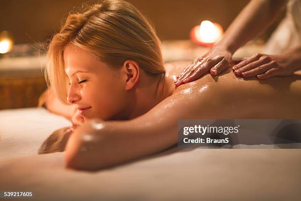 back massage. - masseur stock-fotos und bilder