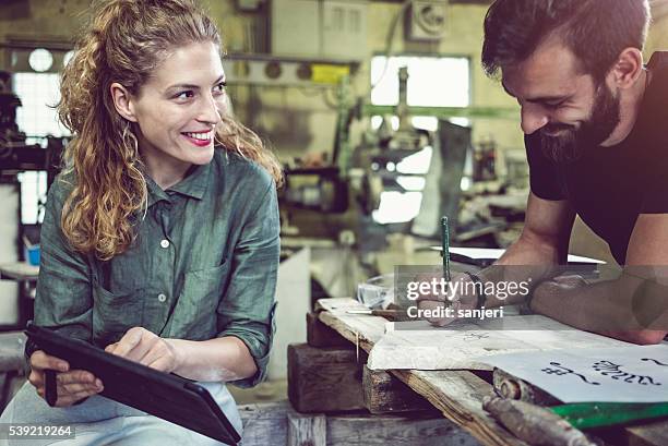 stonecutter at his workshop - tradie stock pictures, royalty-free photos & images