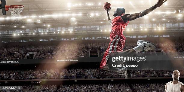 basketball slam dunk - basketball sport stock pictures, royalty-free photos & images