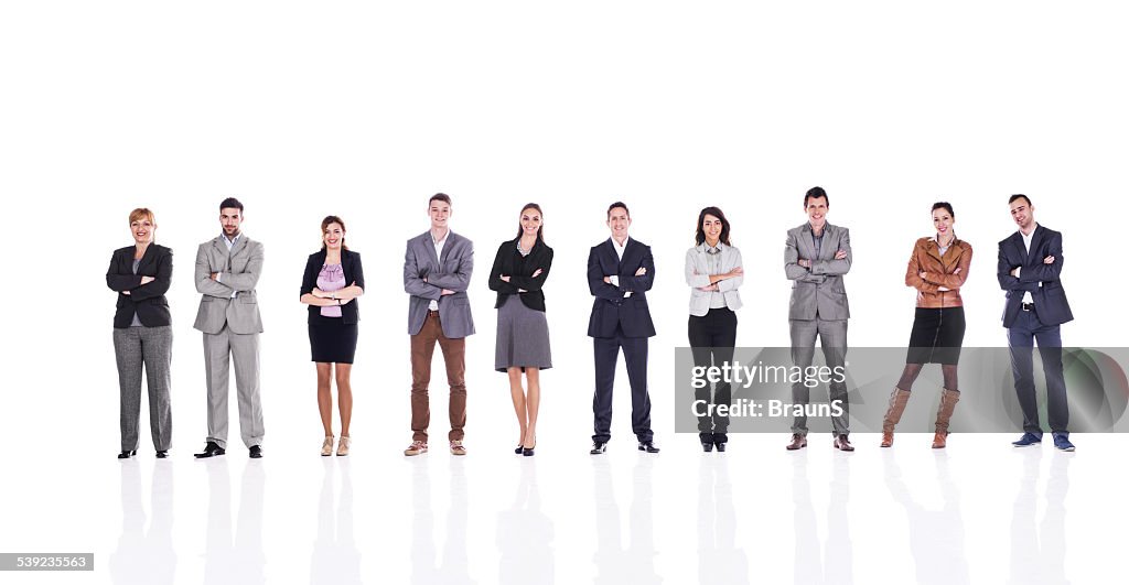 Business people with crossed arms isolated on white.