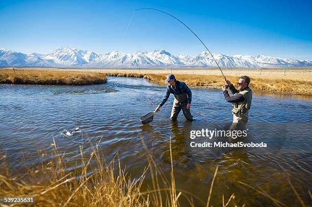 angeln buddys - waders stock-fotos und bilder