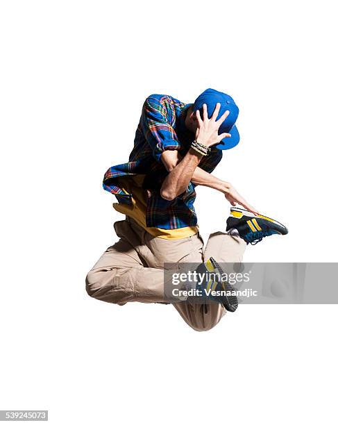 giovane uomo danza, salta - hip hop foto e immagini stock