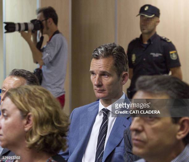 Former Olympic handball player Inaki Urdangarin sits during a hearing held in the courtroom at the Balearic School of Public Administration building...