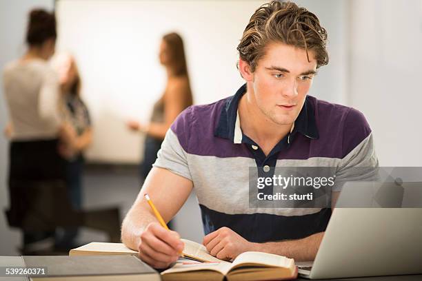 College Student Working Hard Photos and Premium High Res Pictures ...