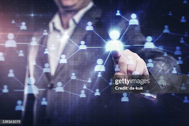 businessman pressing social network button on modern digital display - button concept stock pictures, royalty-free photos & images