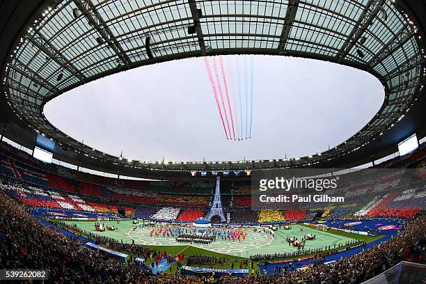 Patrouille de France flies over the stadium during the opening ceremony prior to the UEFA Euro 2016 Group A match between France and Romania at Stade...