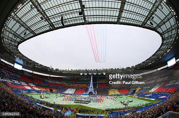 Patrouille de France flies over the stadium during the opening ceremony prior to the UEFA Euro 2016 Group A match between France and Romania at Stade...