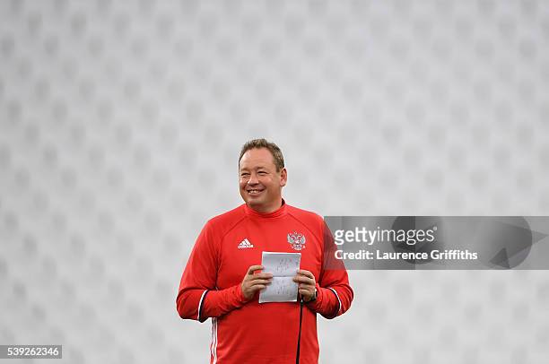Leonid Slutsky of Russia looks on during a Russia training session ahead of the EURO 2016 Group B match against England at Stade Velodrome on June...