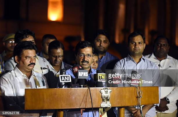 Delhi Chief Minister Arvind Kejriwal, along with MLAs of Aam Aadmi Party, and AAP Delhi legislators talking with media person after meeting with...