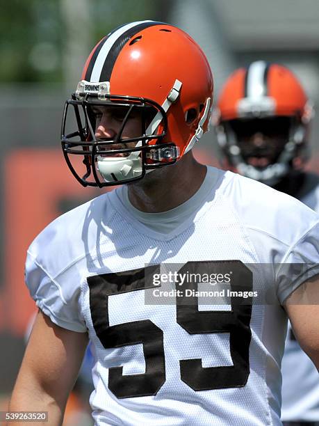 Linebacker Tank Carder of the Cleveland Browns walks onto the field during a mandatory minicamp on June 9, 2016 at the Cleveland Browns training...