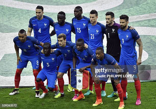 The players of France's national football team, France's forward Dimitri Payet, France's midfielder N'Golo Kante, France's forward Antoine Griezmann,...