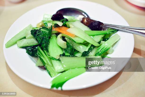 stir-frying of bok choy - close up of bok choy bildbanksfoton och bilder