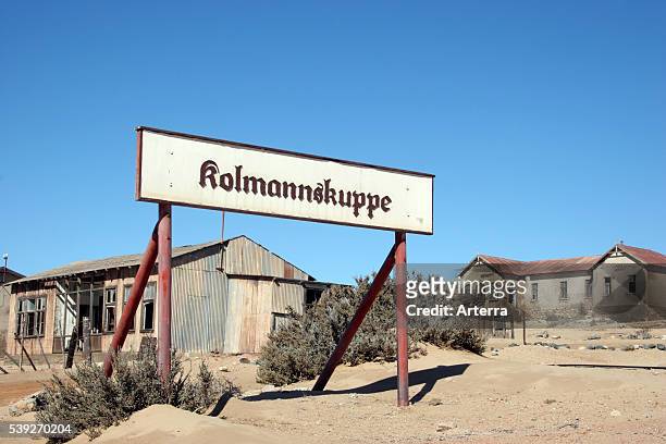 Sign of the ghost town Kolmanskop, an abandoned mining town in the desert, Luderitz, Namibia, South Africa.