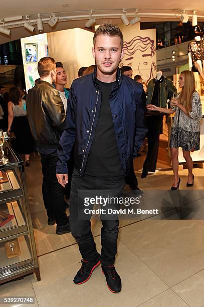 Jeremy Irvine attends the Burberry LC:M event at 121 Regent Street hosted by Christopher Bailey, Burberry Chief Creative and Chief Executive Officer,...