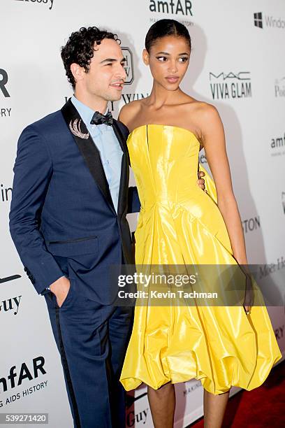 Zac Posen and Aya Jones attend 7th Annual amfAR Inspiration Gala New York at Skylight at Moynihan Station on June 9, 2016 in New York City.