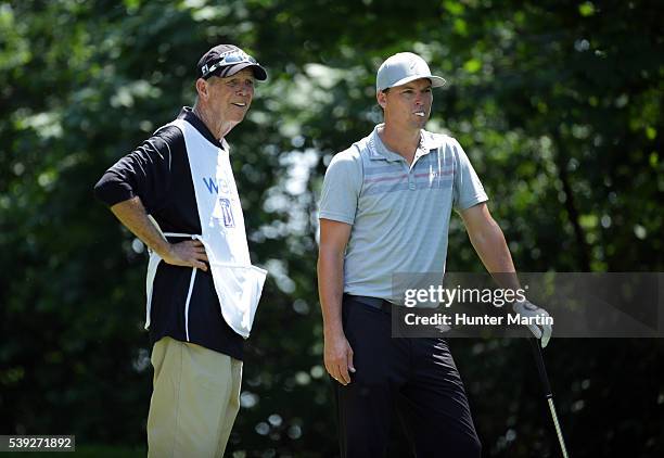 John Mallinger and his caddie stand on the tee on the fourth hole during the second round of the Web.com Tour Rust-Oleum Championship at the Ivanhoe...