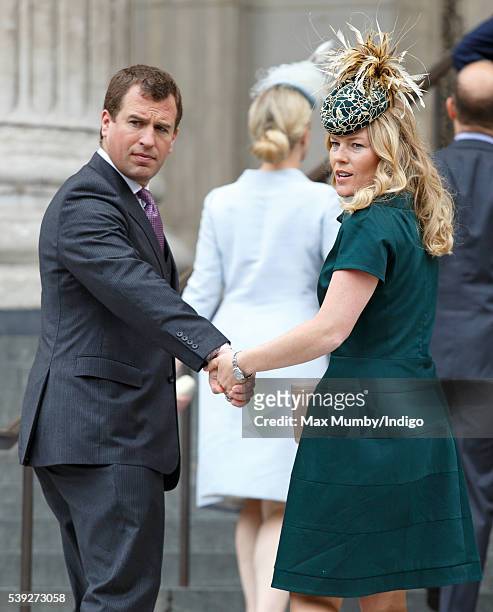 Autumn Phillips and Peter Phillips attend a national service of thanksgiving to mark Queen Elizabeth II's 90th birthday at St Paul's Cathedral on...