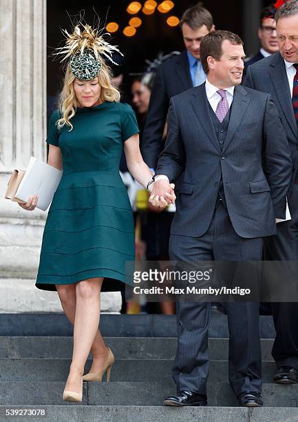 Autumn Phillips and Peter Phillips attend a national service of thanksgiving to mark Queen Elizabeth II's 90th birthday at St Paul's Cathedral on...