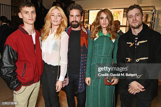 Josh Ludlow, Clara Paget, Jack Guinness, Suki Waterhouse and George Barnett attend the Burberry LC:M event at 121 Regent Street hosted by Christopher...