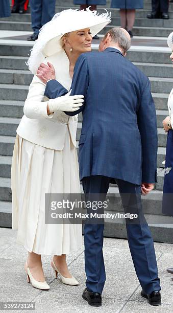 Princess Michael of Kent kisses Prince Edward, Duke of Kent as they attend a national service of thanksgiving to mark Queen Elizabeth II's 90th...