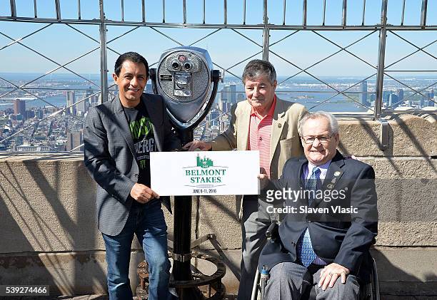 Legendary Triple Crown-winning jockers Victor Espinoza , Jean Cruguet and Ron Turcotte visit The Empire State Building in celebration of the 148th...