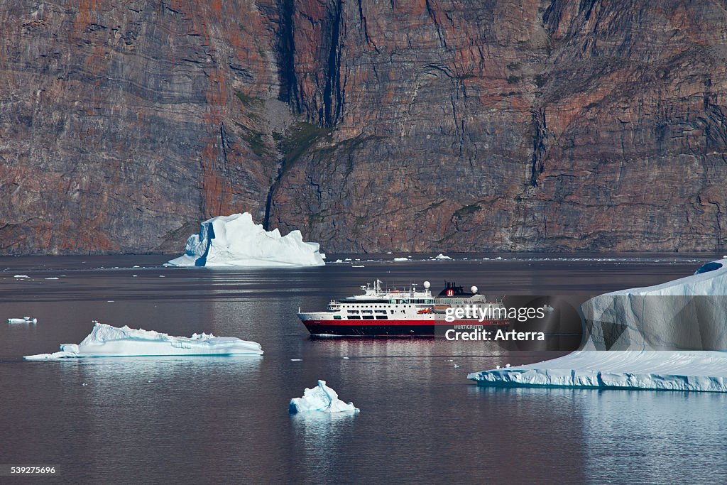 Cruise ship among icebergs in the Uummannaq fjord