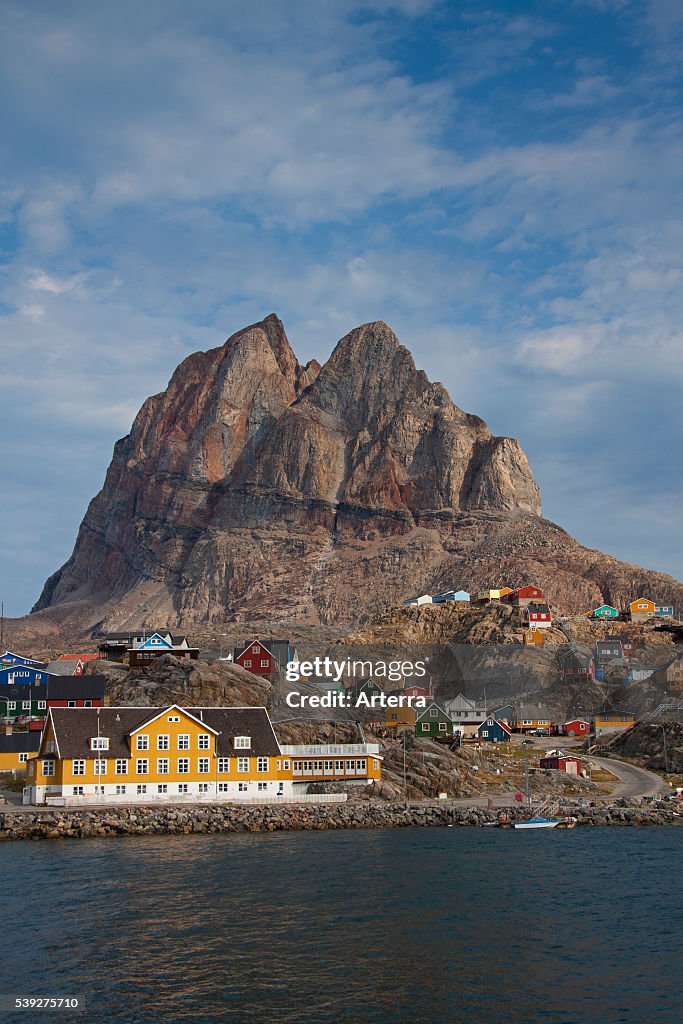 Uummannaq village with colourful houses in front of Heart Mountain