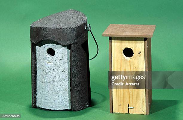 Two different nestboxes for small garden birds like great tits .