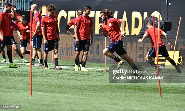 Kyle Beckerman and other members of the US national team take part in a training session in Philadelphia on June 10 on the eve of US's Copa America...