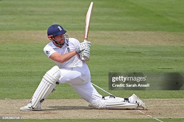 Jonny Bairstow sweeps during day two of the 3rd Investec Test match between England and Sri Lanka at Lord's Cricket Ground on June 10, 2016 in...