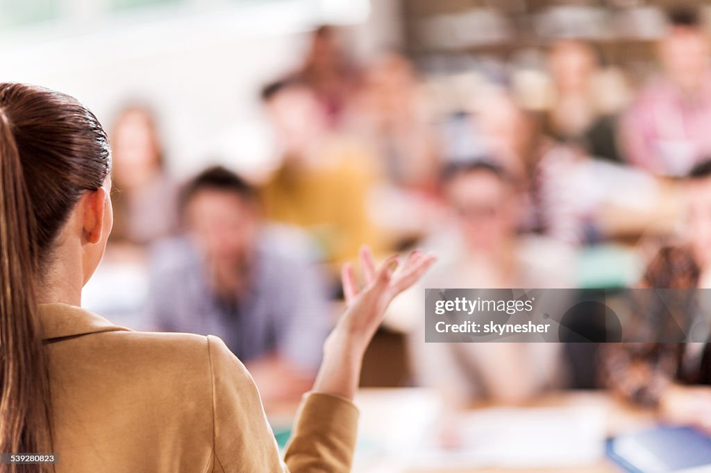 Teacher giving a lecture.