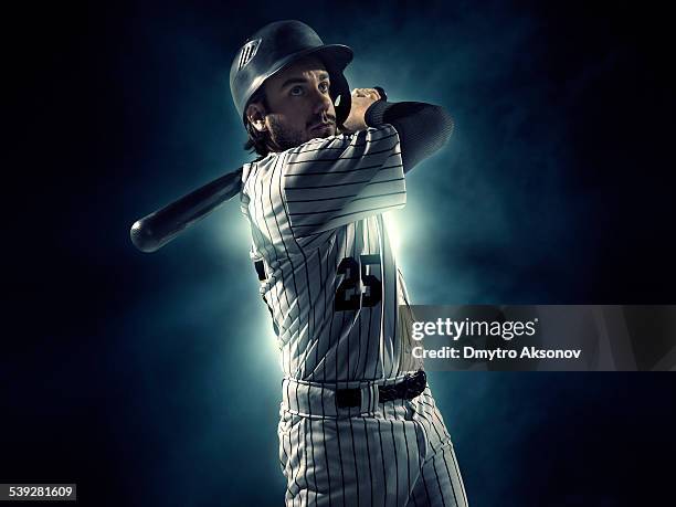 baseball player - bat stockfoto's en -beelden