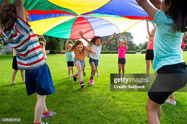 outdoor games - group exercising stock pictures, royalty-free photos & images