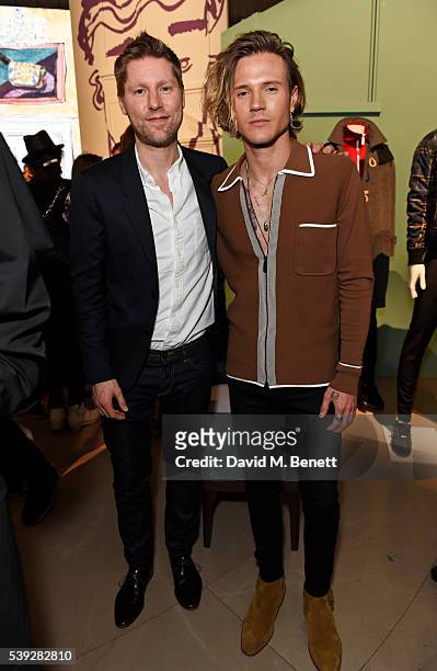Christopher Bailey and Dougie Poynter attend the Burberry LC:M event at 121 Regent Street hosted by Christopher Bailey, Burberry Chief Creative and...