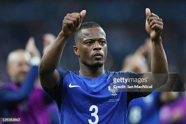 Patrice Evra of France gestures to the fans during the UEFA EURO 2016 Group A match between France and Romania at Stade de France on June 10, 2016 in...