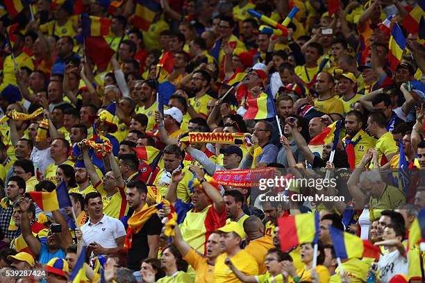 Romanian fans cheer on their team during the UEFA Euro 2016 Group A match between France and Romania at Stade de France on June 10, 2016 in Paris,...