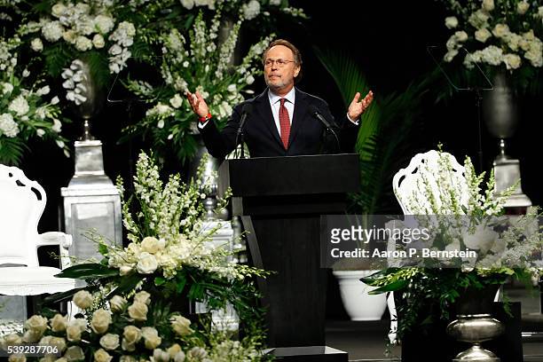 Billy Crystal speaks during a memorial service for boxing legend Muhammad Ali on June 10, 2016 at the KFC Yum! Center in Louisville, Kentucky. Ali...