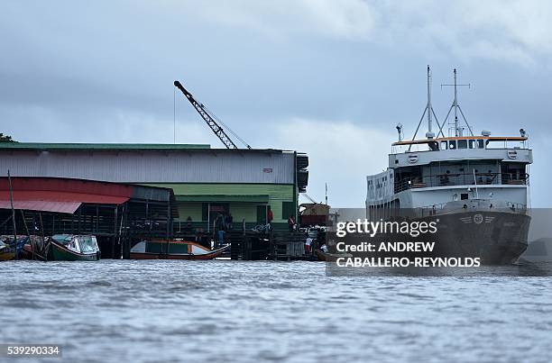 Boat transporting mining cargo is docked in the town of Bartica, Guyana on June 6, 2016. Bartica is a town at the confluence of two major rivers and...