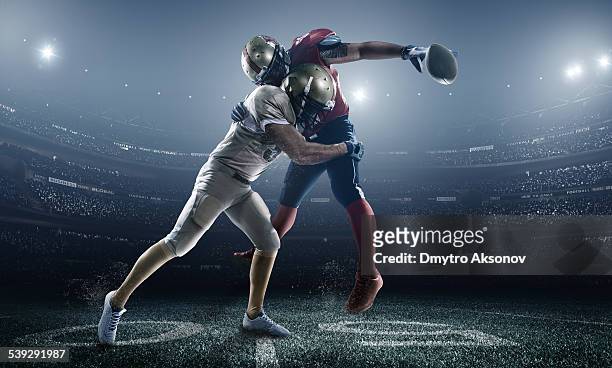 american football in action - tackling stock pictures, royalty-free photos & images
