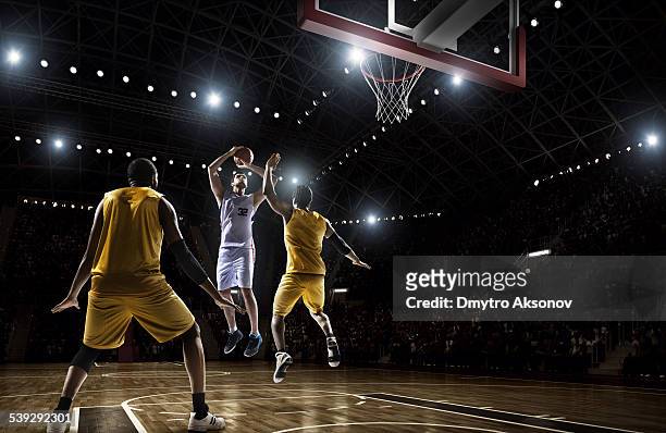 basketball game - taking a shot sport stock pictures, royalty-free photos & images