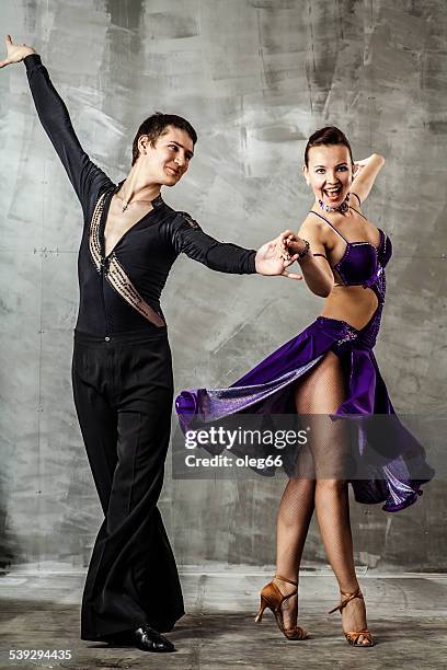 couple dancing, ballroom dancing - rumba stock pictures, royalty-free photos & images