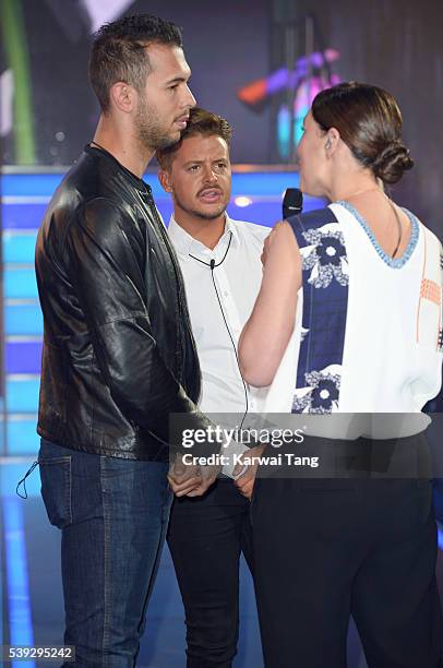 Fake evictees Andrew Tate and Ryan Ruckledge chats to presenter Emma Willis at the Big Brother house at Elstree Studios on June 10, 2016 in...