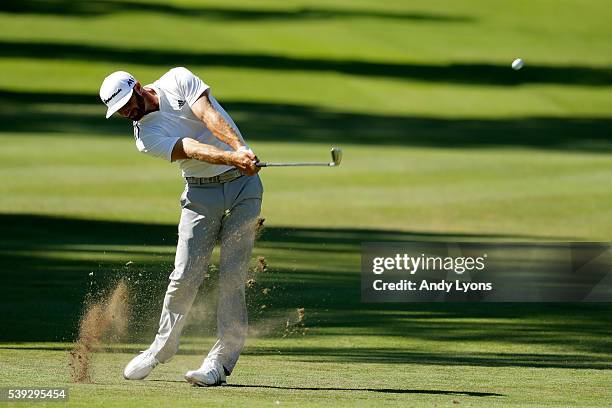 Dustin Johnson plays a shot on the 15th hole during the second round of the FedEx St. Jude Classic at TPC Southwind on June 10, 2016 in Memphis,...