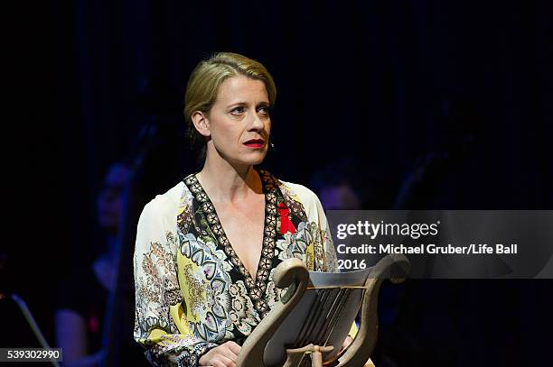 Caroline Peters reads on stage during the Red Ribbon Celebration Concert at Burgtheater on June 10, 2016 in Vienna, Austria. The Red Ribbon...