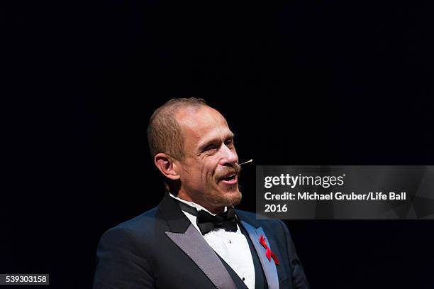 Gery Keszler speaks on stage during the Red Ribbon Celebration Concert at Burgtheater on June 10, 2016 in Vienna, Austria. The Red Ribbon Celebration...