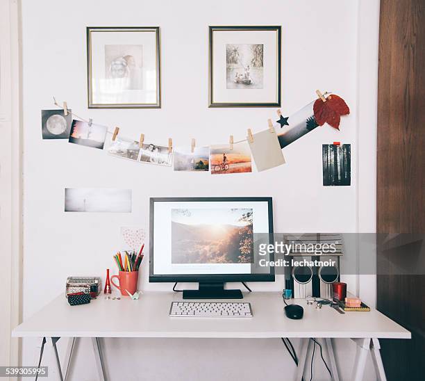 creative workspace desk - picture frame desk stock pictures, royalty-free photos & images
