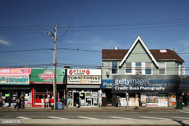 storefronts along beach 116th street, seaside, rockaway beach, queens, new york city - rockaway beach stock pictures, royalty-free photos & images
