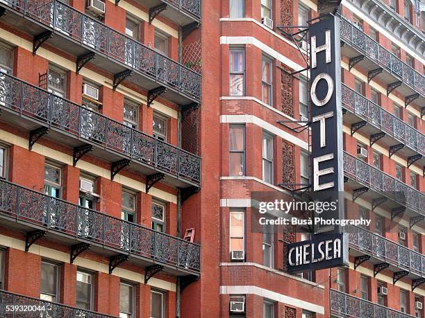 facade of the famous chelsea hotel, located at 222 west 23rd street in manhattan, new york - hotel chelsea new york fotografías e imágenes de stock